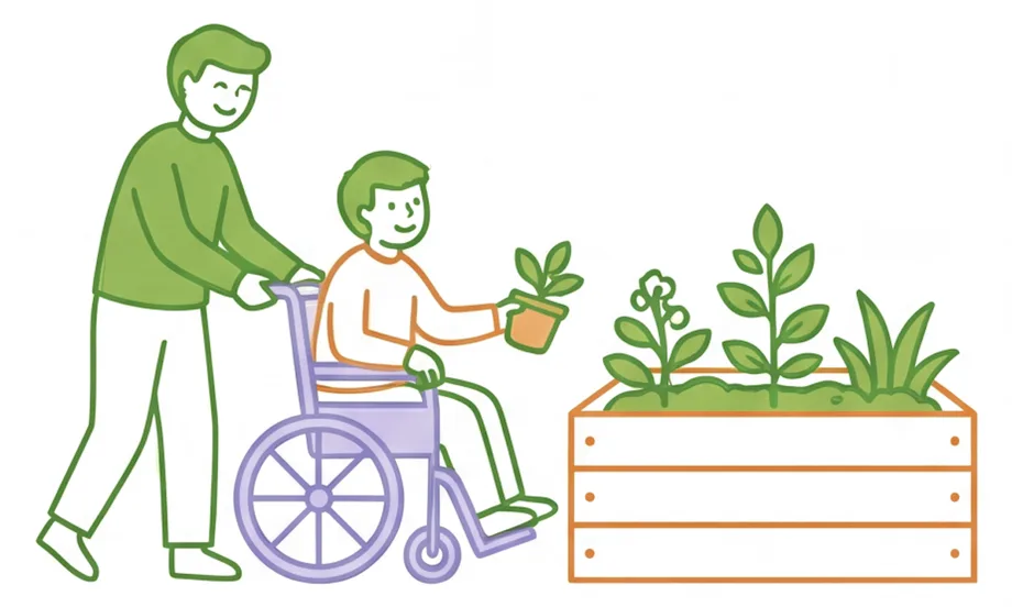 Support worker and a boy in a wheelchair planting flowers together in a garden bed