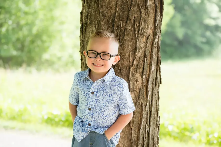 Young participant smiling outdoors